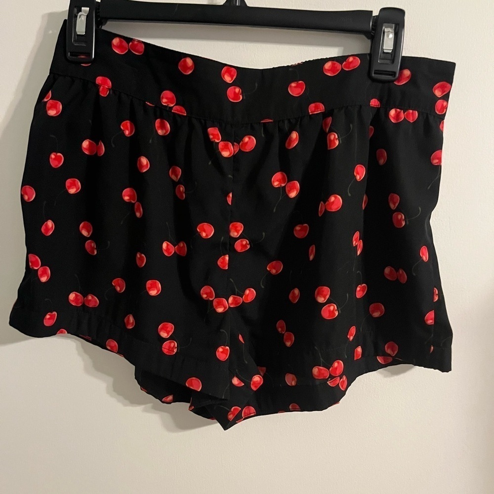 Black Shorts with Red Cherry Print Shorts are 11in long. 27in waist - Picture 1 of 3